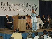 Chinmoy giving opening meditation at the Parliament of World Religions, Chicago, 1993