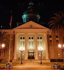 The old Polk County Courthouse at the corner of Broadway Avenue and Main Street Polk courthouse atnite2.jpg