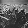 Rendu Glacier, rock covered tidewater glacier terminus, icefield, and hanging glaciers, September 12, 1973 (GLACIERS 5827).jpg