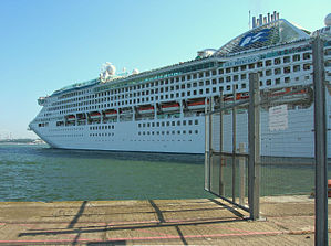 The cruise ship Sea Princess leaving the port of Southampton; fences are visible on the right, which prevent access to the ship under the ISPS Code. Sea Princess Southampton.jpg