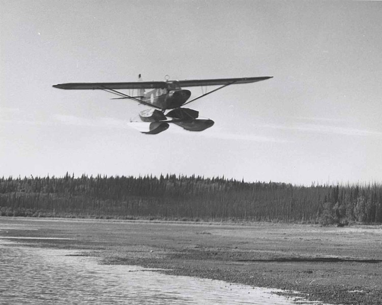 File:Small float plane in flight.jpg