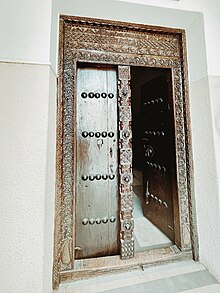 Swahili door at the entrance of the National Museum of Tanzania Swahili door, national museum, Tanzania.jpg