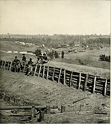 Men of the 1st Michigan Engineers regiment resting outside Atlanta The photographic history of the Civil War - in ten volumes (1911) (14576470457).jpg
