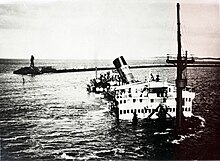 Jan Pieterszoon Coen scuttled as a blockship in IJmuiden harbour mouth Tot zinken gebracht s s J P ID345217.jpg