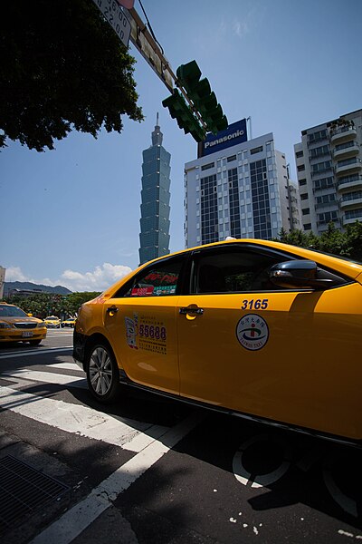 File:Toyota Camry taxi and Donghua Building 20120704.jpg