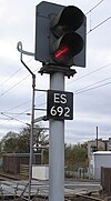 A two-aspect signal maintained by Network Rail