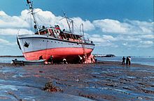 E. Lester Jones aground on the mudflats of the Nushagak River in Alaska, ca. 1950. USC&GS Lester Jones aground.jpg
