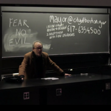 Professor John Womack (Harvard class of 1959) lectures Occupy Harvard at a December 7, 2011 teach-in, urging the audience to learn more about the 99% they wish to engage and assist Womack @ teach in.png