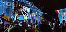 Medal ceremony after women's 15 km individual event at Medal Plaza of the University, Karl Johans gate, 9 March 2016. From left to right: Laura Dahlmeier, Marie Dorin Habert and Anais Bescond. World Championship Biathlon Oslo 2016 Medal Ceremony 9 March.jpg