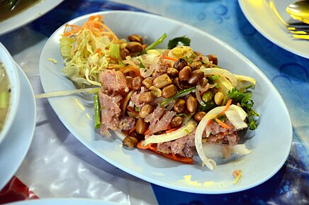 Nam Khao – a Laotian salad prepared with naem and other ingredients