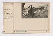 111-SC-1567 - A view of the captured Germans on the deck of the sinking U-boat - NARA - 55164465.jpg