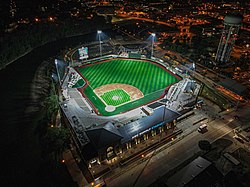 An overhead view of a baseball park at night