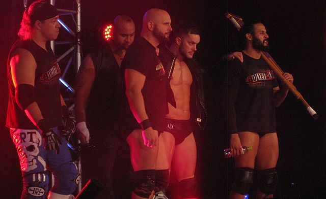 Tonga (far right) with Bullet Club in September 2013