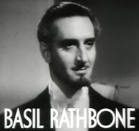 Basil Rathbone in Tovarich trailer.jpg