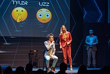 Tyler Groce and Lizz Biddy Kemery perform on stage at Boom Chicago in 2019 Boom tyler and Lizz shhhh.jpg