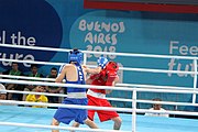 Deutsch: Boxen bei den Olympischen Jugendspielen 2018 Tag 12, 18. Oktober 2018 - Finale im Leichten Weltergewicht Jungen – Ilia Popov (Russland, rot) schlägt Talgat Shaiken (Kasachstan, blau) 4-1; Ringrichter ist James Beckles (Trinidad und Tobago). English: Boxing at the 2018 Summer Youth Olympics on 18 October 2018 – Final Light Welterweight Boys Bout - Ilia Popov (Rusia, rojo) supera a Talgat Shaiken (Kazajstán, azul) 4-1; Referee is James Beckles (Trinidad and Tobago). Español: Boxeo en los Juegos Olímpicos Juveniles de Verano de 2018 en 18 de octubre de 2018 - Chicos de peso welter ligero final: Ilia Popov (Uzbekistán, roja) le gana a Talgat Shaiken (Egipto, azul) 4-1; El árbitro es James Beckles (Trinidad y Tobago).