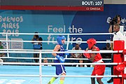 Deutsch: Boxen bei den Olympischen Jugendspielen 2018 Tag 12, 18. Oktober 2018 - Finale Fliegengewicht Mädchen – Martina La Piana (Italien, blau) schlägt Adijat Gbadamosi (Nigeria, rot) 5-0; Ringrichter ist James Beckles (Trinidad und Tobago). English: Boxing at the 2018 Summer Youth Olympics on 18 October 2018 – Girl's flyweight Gold Medal Bout - Martina La Piana (Italy, blue) beats Adijat Gbadamosi (Nigeria, red) 5-0; Referee is James Beckles (Trinidad and Tobago). Español: Boxeo en los Juegos Olímpicos Juveniles de Verano de 2018 en 18 de octubre de 2018 - Combate a medalla de oro de peso mosca para mujeres: Martina La Piana (Italia, azul) le gana a Adijat Gbadamosi (Nigeria, roja) 5-0; El árbitro es James Beckles (Trinidad y Tobago).