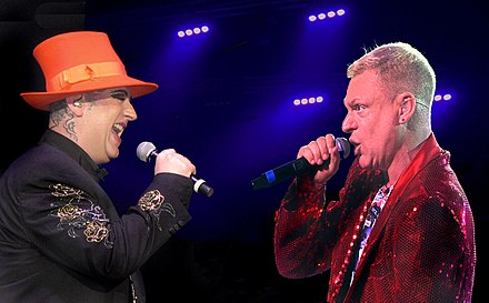 George and Andy Bell of Erasure (pictured in 2011) kissed on stage at the 1989 Brit Awards in London to cheers from the crowd.