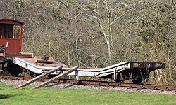 A British Railways' Lowmac preserved on the Bodmin and Wenford Railway British Railways Lowmac WP 904546 at Bodmin Parkway.jpg