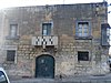 Building with coat of arms and two niches.jpg