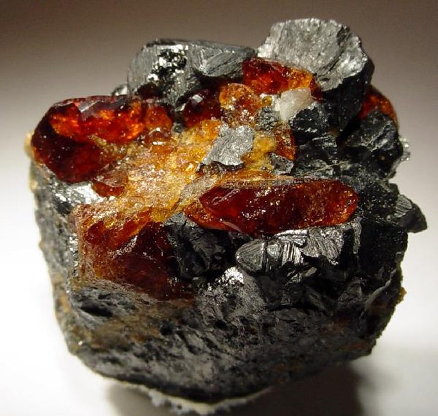 Red chondrodite and black magnetite from the old Tilly Foster Mine in Brewster