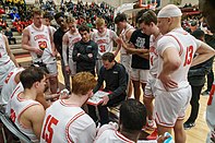 Coach Brian Earl and Cornell basketball players.jpg