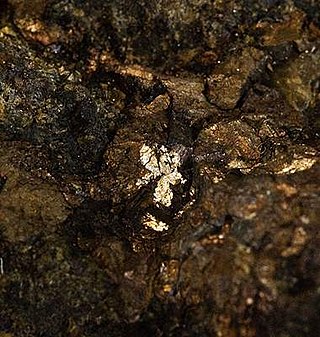 <span class="mw-page-title-main">Valleriite</span> Uncommon sulfide-hydroxide mineral of iron and copper