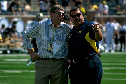 Athletic director Dave Brandon (left) with head coach Brady Hoke in 2011.