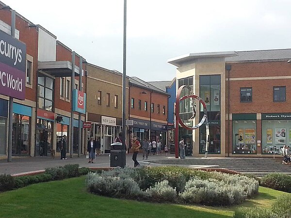 Didcot town centre, including the modern art installation The Swirl