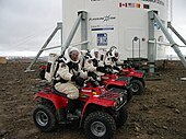 Robert Zubrin, Vladimir Pletser, and Katy Quinn of Crew 2 prepare to begin a motorized EVA on July 15, 2001.