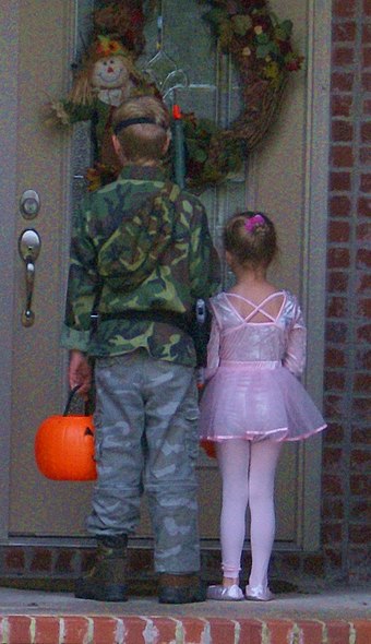 Two children trick-or-treating on Halloween in Arkansas, United States