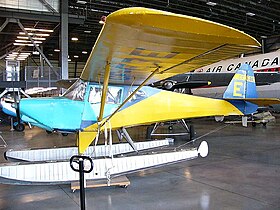 Fleet Canuck CF-EBE, monté sur flotteurs. Cet appareil, le no 149, est dans l'entrepôt de stockage du Canada Aviation and Space Museum, à l'Aéroport d’Ottawa-Rockcliffe[2].