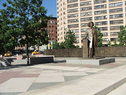 Frederick Douglass traffic circle, at the intersection of Frederick Douglass Boulevard (8th Ave) and 110th St (Central Park North) in Harlem