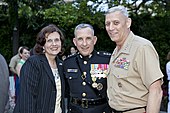 From left to right: Debbie Paxton; Lt. Gen. George J. Flynn; and the Assistant Commandant of the Marine Corps, Gen. John M. Paxton Jr., pose for a photo after Flynn's retirement ceremony, 9 May 2013. From left, Debbie Paxton; U.S. Marine Lt. Gen. George J. Flynn; and the Assistant Commandant of the Marine Corps, Gen. John M. Paxton, Jr., pose for a photo after Flynn's retirement ceremony at Marine Barracks 130509-M-KS211-275.jpg