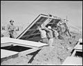 Granada Relocation Center, Amache, Colorado. Pre-fabricated wall sections are raised at the place b . . . - NARA - 538731.jpg