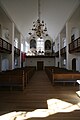 Hans Egedes Kirke. Interiør set fra alteret. Vidvinkel. Portrætformat.