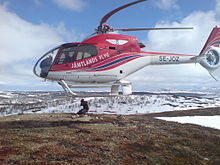 A Eurocopter EC-120 helicopter - the rotor blades seem to be swept back more than usual due to the rolling-shutter effect. Jamtlands Flyg EC120B Colibri.JPG