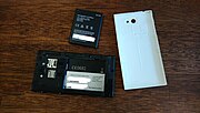 Thumbnail for File:Jolla Phone (J1) next to its white "the other half" back cover and battery.jpg