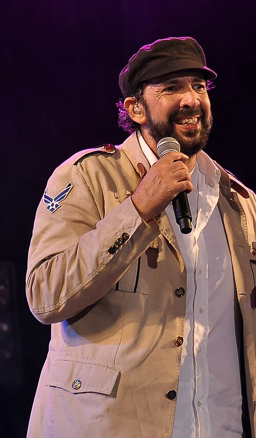 Juan Luis Guerra (pictured) performed a bachata cover version of "Vuelve" in 2006.