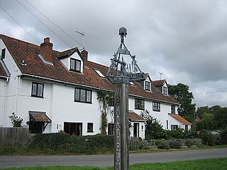 A large house by the Swannington village sign Large house by Swannington village sign - geograph.org.uk - 527884.jpg