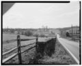 Looking southwest along State Route 92 (Thompson Bridge Road) toward State Routes 92 and 100 intersection, rail fence and stone wall on left. - Winterthur Farms, Intersection State HABS DEL,2-WIN,1-13.tif