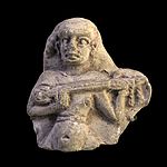 Elamite lute player late 14th century and early 12th century BC