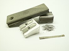 Products made of magnesium: firestarter and shavings, sharpener, magnesium ribbon Magnesium-products.jpg