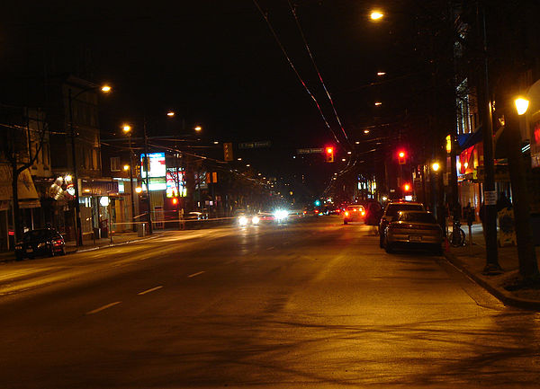 Main Street at night near 26th Avenue, looking north