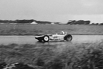 V. Davies's 1500cc Mallock U2 at the Llandow Circuit, South Wales, August 1966. Scanned print taken with a Halina 35X Super. Mallock U2 (24021050261).jpg