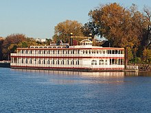 The Minnesota Centennial Showboat from across the Mississippi River Minnesota Centennial Showboat.jpg