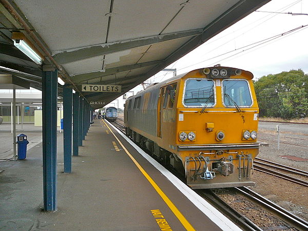 An electric EF class backing onto the Overlander at Palmerston North Railway Station, 2007.