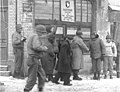 Photograph of Generals of the 101st Airborne Division Reviewing Troops of the 101st Division in Bastogne, Belgium - NARA - 12010179.jpg
