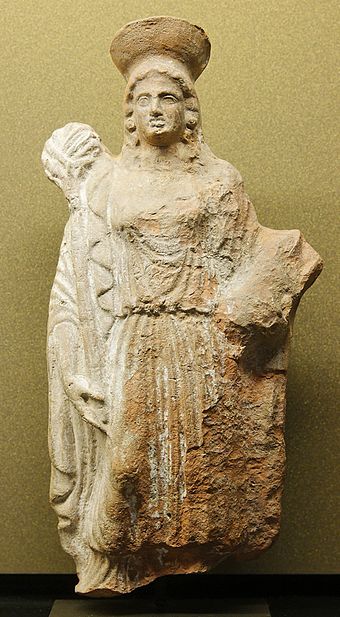 Female figure carrying a torch and piglet to celebrate rites of Demeter and Persephone (from Attica, 140–130 BCE)