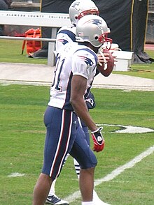 Moss (with the Patriots) on the field prior to an away game against Oakland, 2008 Randy Moss at Patriots at Raiders 12-14-08 2.JPG